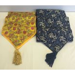 2 silk oriental table runners - yellow and blue, both have dragon design.