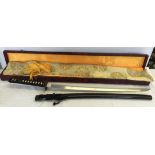 A Katana Kobuse style Samurai sword with Tamahagne steel blade in original case. Made to order for