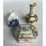 3 small oriental ceramic items; 2 bud vases and a lidded pot.