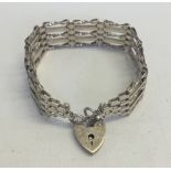 A hallmarked silver 5 bar bracelet, approx 17.5g.