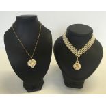 2 necklaces made with freshwater pearls. One with a heart shaped pearl pendant on an 18" 9ct gold