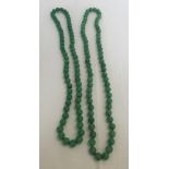 2 strings of jade beads