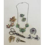 A small quantity of costume jewellery to include Mizpah matching brooch and earrings with stag