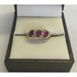 A 9ct gold ruby & diamond ring size M. Total weight approx 1.9g.