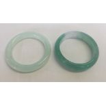 2 Jade bangles approx 8cm diameter