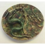 Antique Majolica dish with snake and insect decoration. Some firing faults, approx 23cm diameter