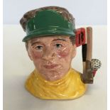 A Royal Doulton toby jug - The Golfer