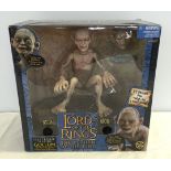 A boxed Lord of the Rings electronic talking Gollum with interchangable Smeagol head from 'The