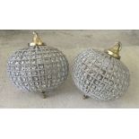 A pair of ball shaped chandelier style lampshades with glass beads and brass fittings. Approx 30 x