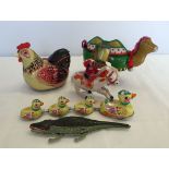 5 boxed tinplate animal toys. 2 battery operated and 3 wind up.