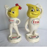 A pair of cast iron reproduction Esso money banks.