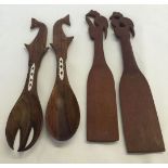 4 carved wooden South Pacific spoons, 2 with mother of pearl inlay from the Soloman Islands and 2