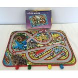 A boxed tinplate mechanical lucky mouse together with a tin plate car track with 3 wind up tin plate