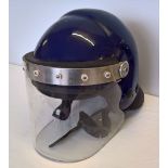 A police riot helmet.