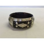 A vintage Tuarag Ebony and silver filigree bracelet.