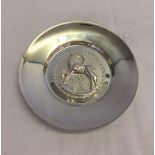 A boxed continental 830 silver pin dish with raised goat decoration. 12cm diameter.