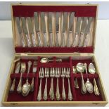 A boxed canteen of cutlery.