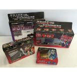 A box of c1980s Transformers to include Optimus Prime.