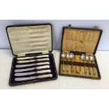 A cased set of 6 silver butter knives with mother of pearl handles, hallmarked Sheffield 1908,