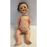 Vintage Heuback Koppelsdorf bisque head doll with composition body. Eyelids damaged, some wear to