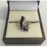 A 9ct gold sapphire & diamond ring. Size K. Total weight approx 2.5g.