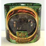 A boxed Lord of the Rings twin playset - Merry & Pippin with Moria Orc from 'The Fellowship of the