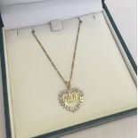 A 9ct gold chain with heart shaped "Mum" pendant set with a small diamond.