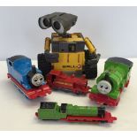 A Wall-E toy together with 3 x Thomas the Tank Engines.