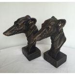 2 cast iron greyhound head figures.