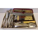 A quantity of silver plated cutlery to include fish knives and forks and mustard spoons.