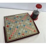 A vintage American table top bubble gum machine & a vintage Scrabble.