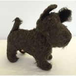 A mid 1950's dark brown Chiltern dog. Approx 8 inches tall x 9.5 inches long.