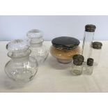 5 silver topped ladies dressing table bottles together with 2 pressed glass lidded pots.