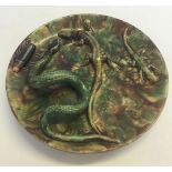 Antique Majolica dish with snake and insect decoration. Some firing faults, approx 23cm diameter