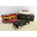 3 boxed tinplate toy cars to include a Lendulet Auto Jaguar.