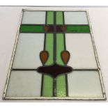 A stained glass panel, 82 x 48cm.