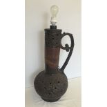 A large West German Lamp in brown glaze 63cm tall.