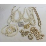 A collection of 10 faux pearl necklaces of various designs, together with a pendant and earrings.