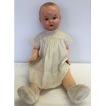 An Armand Marseille doll. Has has some restoration.