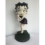 A reproduction cast iron Betty Boop doorstop. Approx 36cm high.