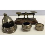 A small selection of metalware items comprising a set of letter scales, a pin cushion hat a/f, a