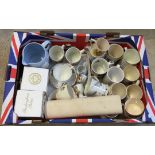 A box of ceramic commemorative items to include: cups & saucers, mugs & egg cups.