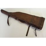 A leather leg of mutton gun case.