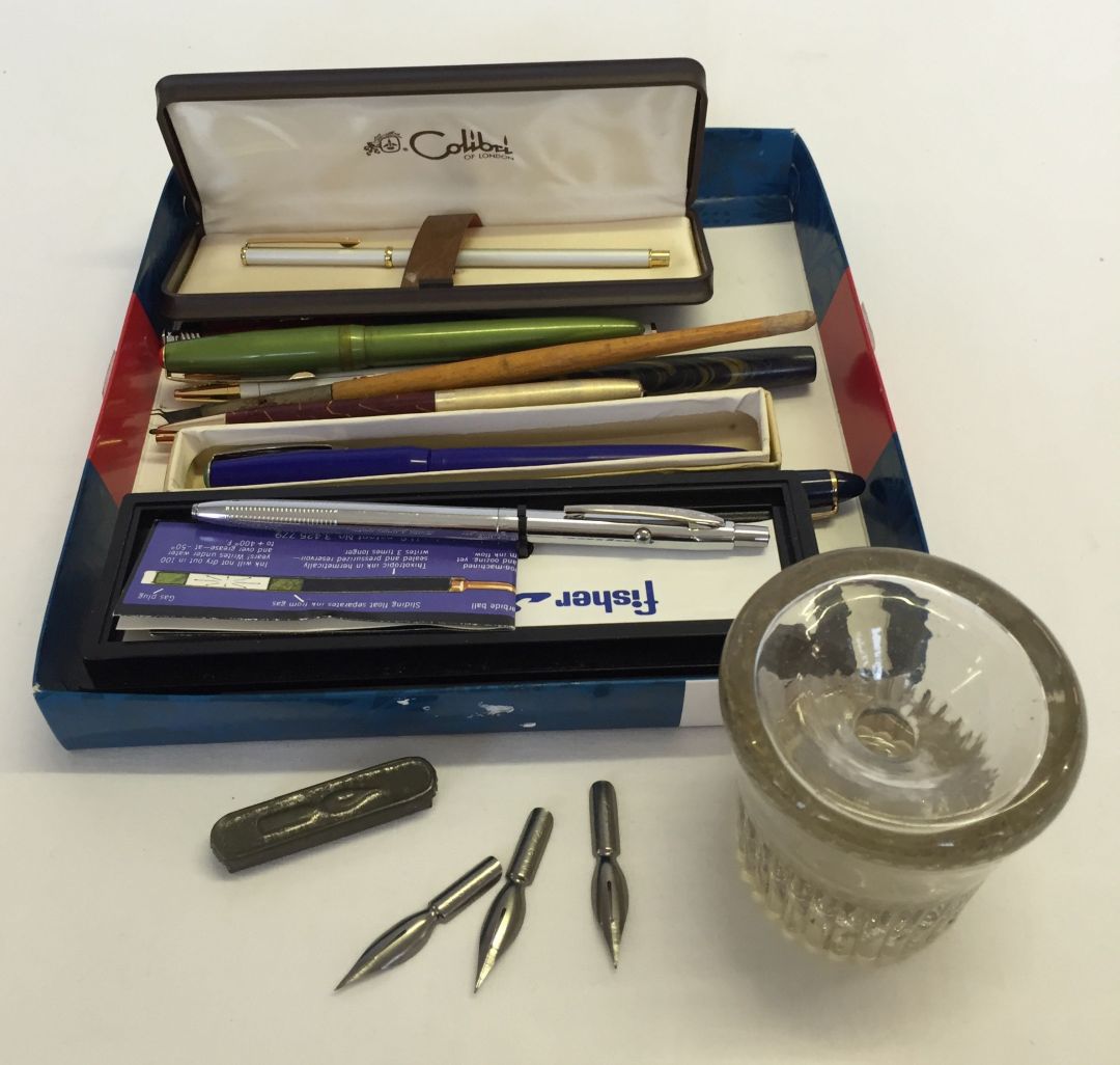 A quantity of pens to include a Fisher Spacepen and a Colibri ladies ball point pen boxed.