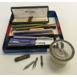 A quantity of pens to include a Fisher Spacepen and a Colibri ladies ball point pen boxed.