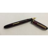 A black & pink 'Burnham' fountain pen with 14ct gold nib.