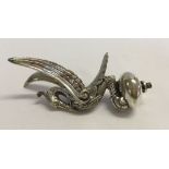 A silver plated decorative figure of a bird/phoenix, possibly a car mascot. Approx height 10cm.