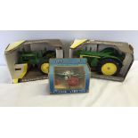 3 boxed Ertl tractors: 1) A 1:16 scale 1937 John Deere Model G tractor. 2) A 1:16 John Deere 1956