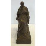 A bronze coloured painted plaster figurine of a Pope. Written underneath "N.F.S Study for the