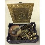 A large crate of assorted brass items to include: candlesticks, plaques & ornaments together with